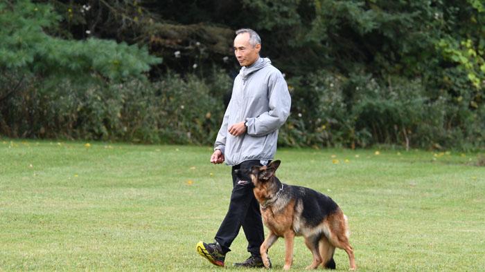 Henry heeling with his dog Cypress